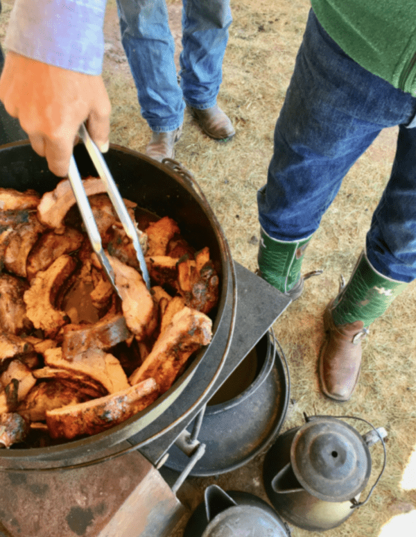 Close-up of barbecued ribs in a pot.